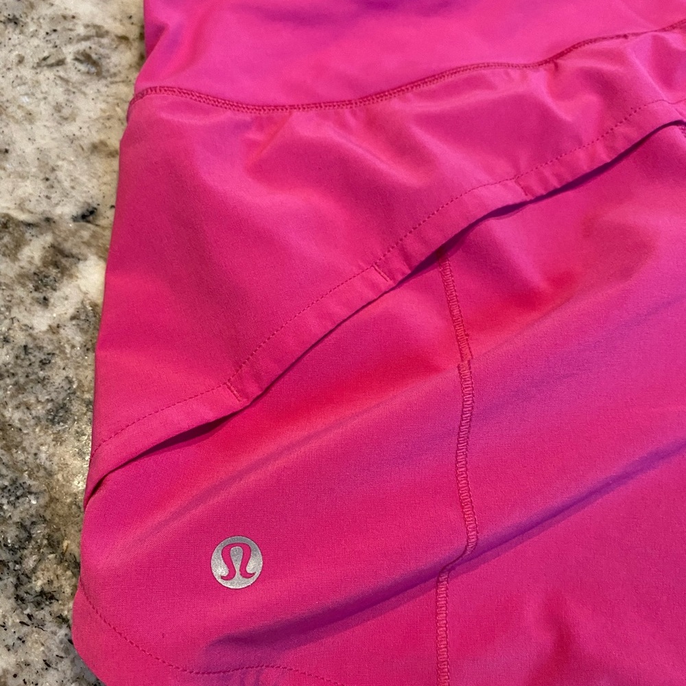 Lululemon sonic pink speed up MR 4”, size 2. In great condition.